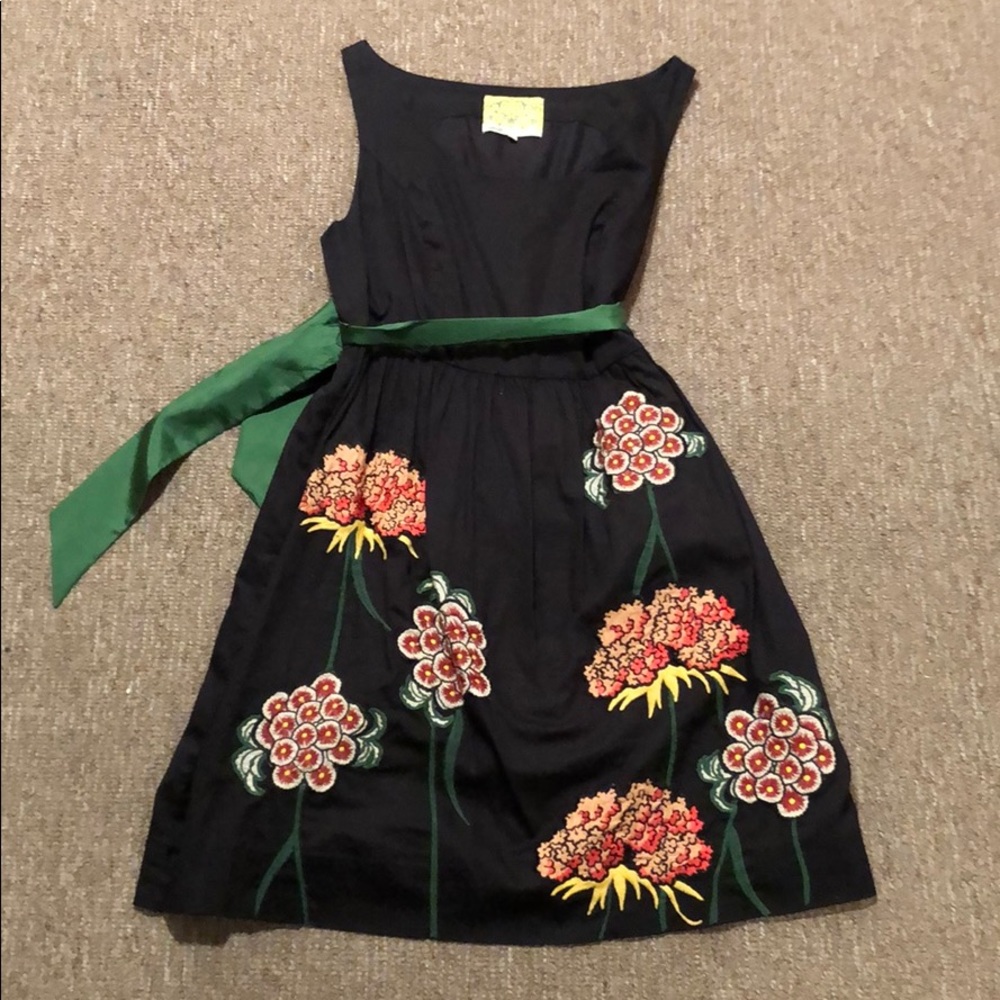 Anthro black dress with embroidered flower skirt.